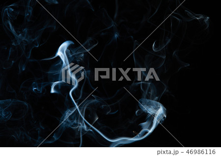 White smoke on black background 46986116