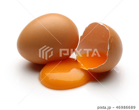 Broken egg on white background 46986689