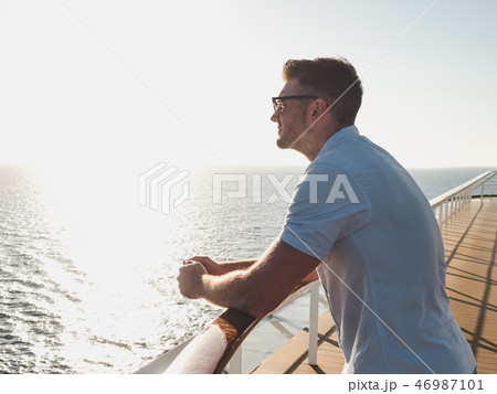 Attractive guy on the deck of a cruise ship Attractive guy on the deck of a cruise ship 46987101