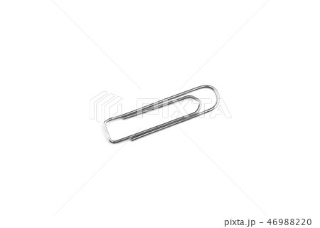 Old steel paper clip isolated on white background Old steel paper clip isolated on white background 46988220