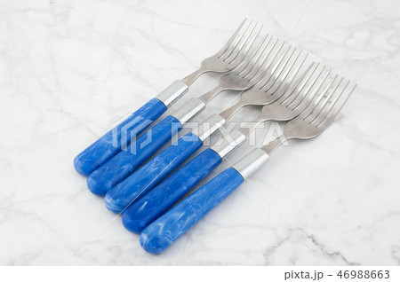 Five forks on white gray background. 46988663