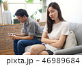 Young girl sitting on sofa is feeling bored 46989684