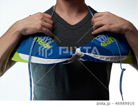 Sport man with running shoes 46989910