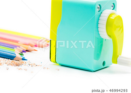 pastel blue yellow rotary pencil sharpener shaving 46994293