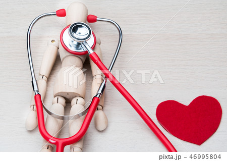 world health day stethoscope and wood man 46995804