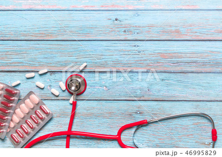 World health day red stethoscope and medicine 46995829