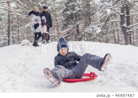child is skating on the ice-boat 46997487