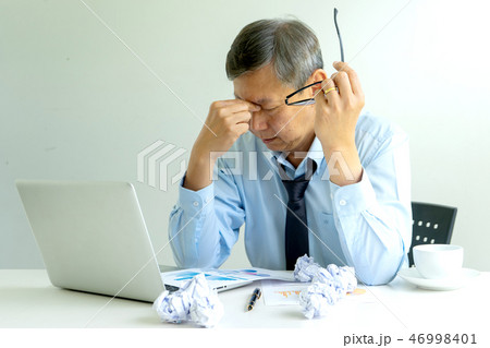 businessman sit at the table fill sad and headache businessman sit at the table fill sad and headache 46998401
