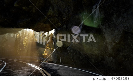 rocky road tonel in mountain at sunset 47002193