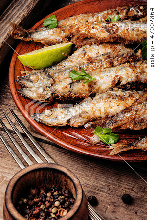 Deep fried fish Deep fried fish 47002864