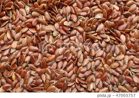 Background of flax seeds, macro shot 47003757