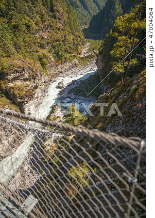 Suspension bridge on the way to Namche Bazar Suspension bridge on the way to Namche Bazar 47004064