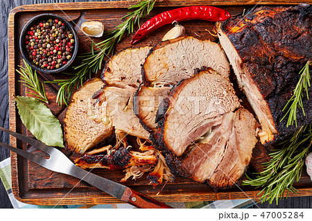 overhead view of Roasted pork ham, flatlay 47005284