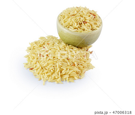Pile of Brown Rice Isolated on White Background Pile of Brown Rice Isolated on White Background 47006318