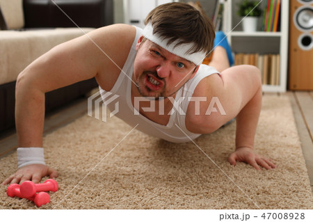A young handsome man with excess weight A young handsome man with excess weight 47008928