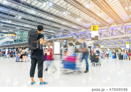 Traveler man at the airport. people movement 47009596