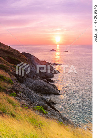 Sunset at the sea in Phuket, Thailand. Sunset at the sea in Phuket, Thailand. 47009845