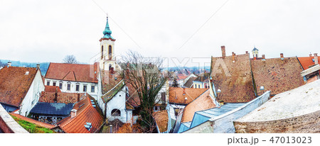 Annunciation church and red roofs of houses Annunciation church and red roofs of houses 47013023