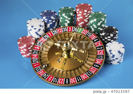 Poker Chips, Roulette wheel in motion, casino  47013597