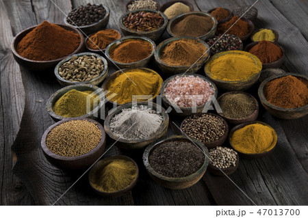 Aromatic spices on wooden background Aromatic spices on wooden background 47013700