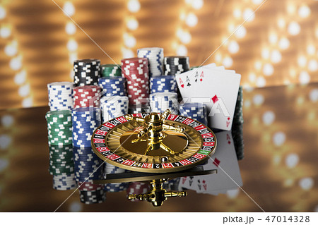 Poker Chips, Roulette wheel in motion, casino Poker Chips, Roulette wheel in motion, casino 47014328