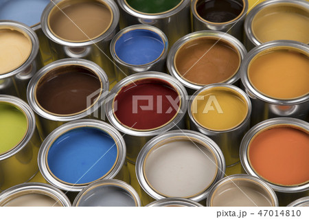 Colours paint can, yellow background Colours paint can, yellow background 47014810