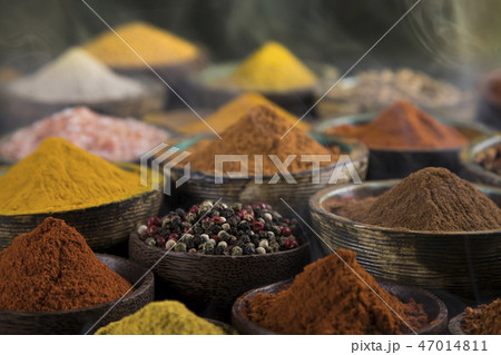 Smoke, Aromatic spices on wooden background Smoke, Aromatic spices on wooden background 47014811