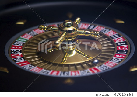Gaming table, roulette wheel in motion Gaming table, roulette wheel in motion 47015363