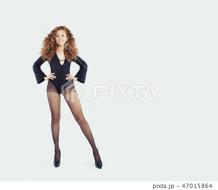 Beautiful woman fashion model in black tights Beautiful woman fashion model in black tights 47015864