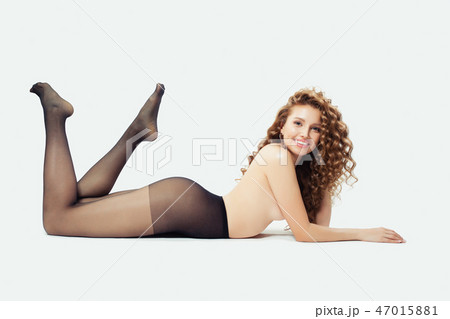 Sexy blonde woman fashion model lying  47015881