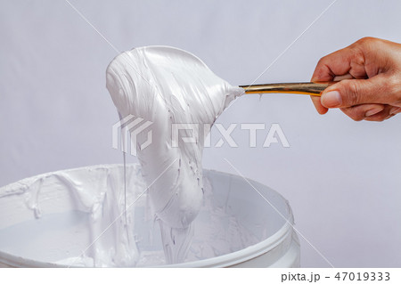white ink in the barrel in white backgroud 47019333