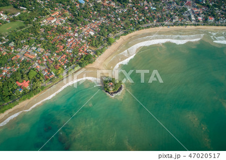 aerial view of coastline and fisherman village aerial view of coastline and fisherman village 47020517