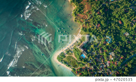 aerial view of coastline and fisherman village 47020535