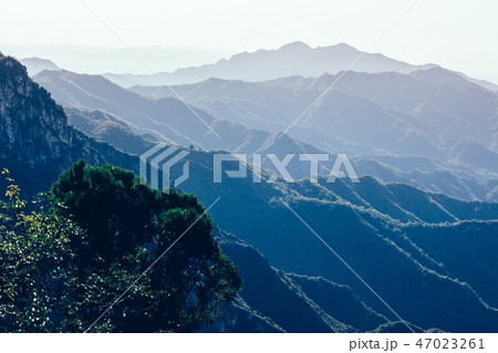 beautiful foggy mountain landscape in china 47023261