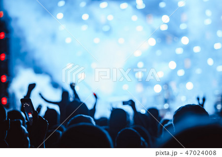 hands of people at the concert 47024008