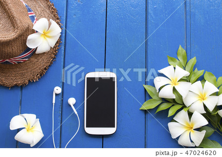 mobile phone and hat of lifestyle woman relax 47024620