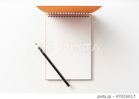 spiral orange notebook with open cover 47026017