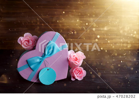 romantic decoration St valentine's day concept with box heart and pink rose on dark wooden romantic decoration St valentine's day concept with box heart and pink rose on dark wooden 47028202