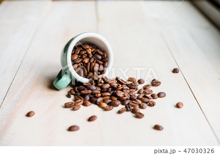 Coffee. Coffee beans. Coffee cup full  47030326