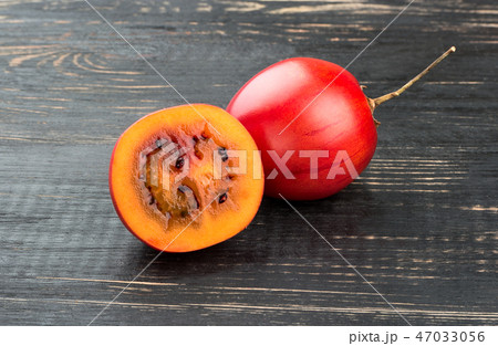 Fruit tamarillo with half 47033056