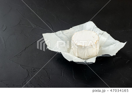 Round brie cheese 47034165