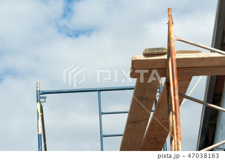 construction site scaffolding and sky 47038163