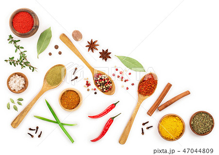 mix of spices in wooden spoon isolated on a white background with copy space for your text. Top view 47044809