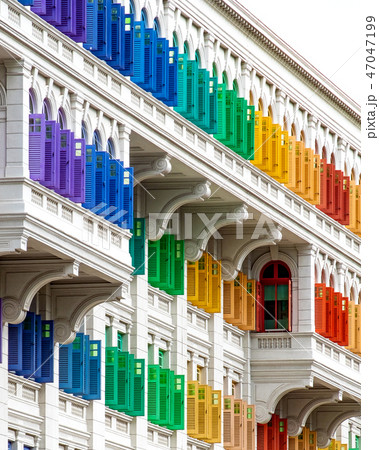 Colourful window shutters of the old building. Colourful window shutters of the old building. 47047199