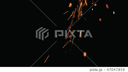 hot sparks falling from above black background hot sparks falling from above black background 47047859