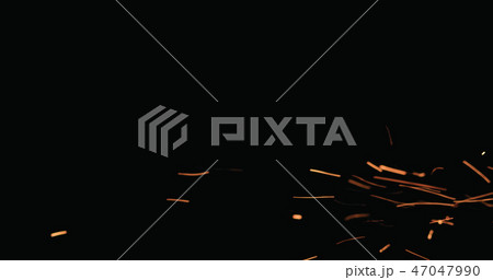 hot sparks floating from side on black background hot sparks floating from side on black background 47047990