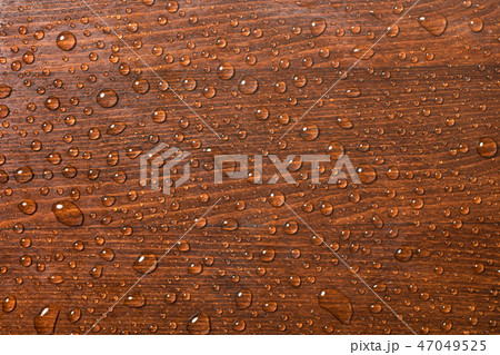 Beautiful wooden background with water drops. Beautiful wooden background with water drops. 47049525