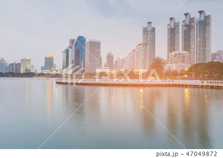 Bangkok city office building over water lake 47049872
