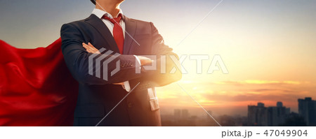 superhero businessman looking at city superhero businessman looking at city 47049904