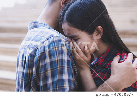 Sad woman hugging her lover 47050977